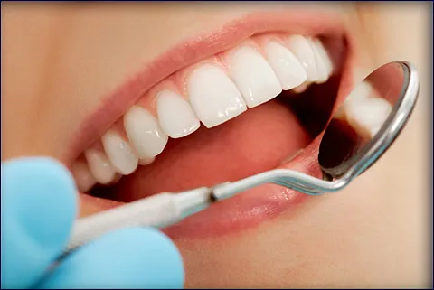 dental-checkup-with-mirror